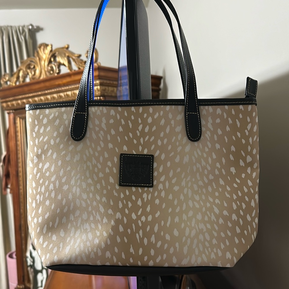 Brand new vinyl mini bag.
